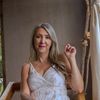 Portrait of Iryna Melnyk, an experienced yoga practitioner.